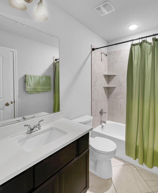 2720 Beutel Road Lorena, TX 76655 - Photo 30 of 37 Full bathroom featuring vanity, shower / bathtub combination with curtain, and light tile patterned floors