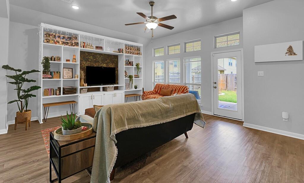 2720 Beutel Road Lorena, TX 76655 - Photo 7 of 37 Living area with wood finished floors, a ceiling fan, and recessed lighting