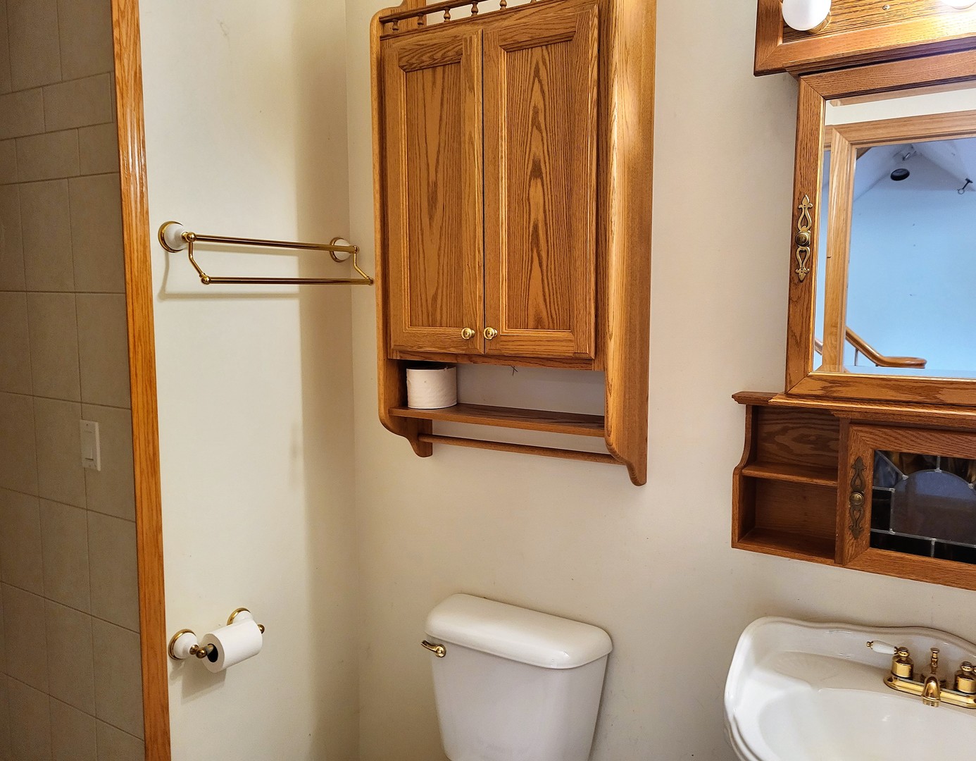 10120 East Hickory Ridge Drive Rochelle, IL 61068 - Photo 29 of 39 a bathroom with a sink a toilet and shower