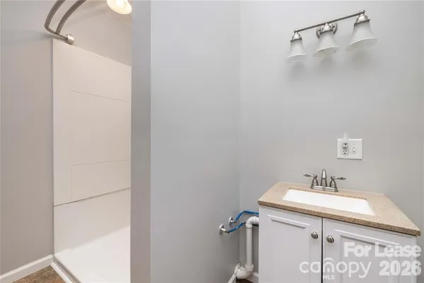 a bathroom with a toilet and a sink