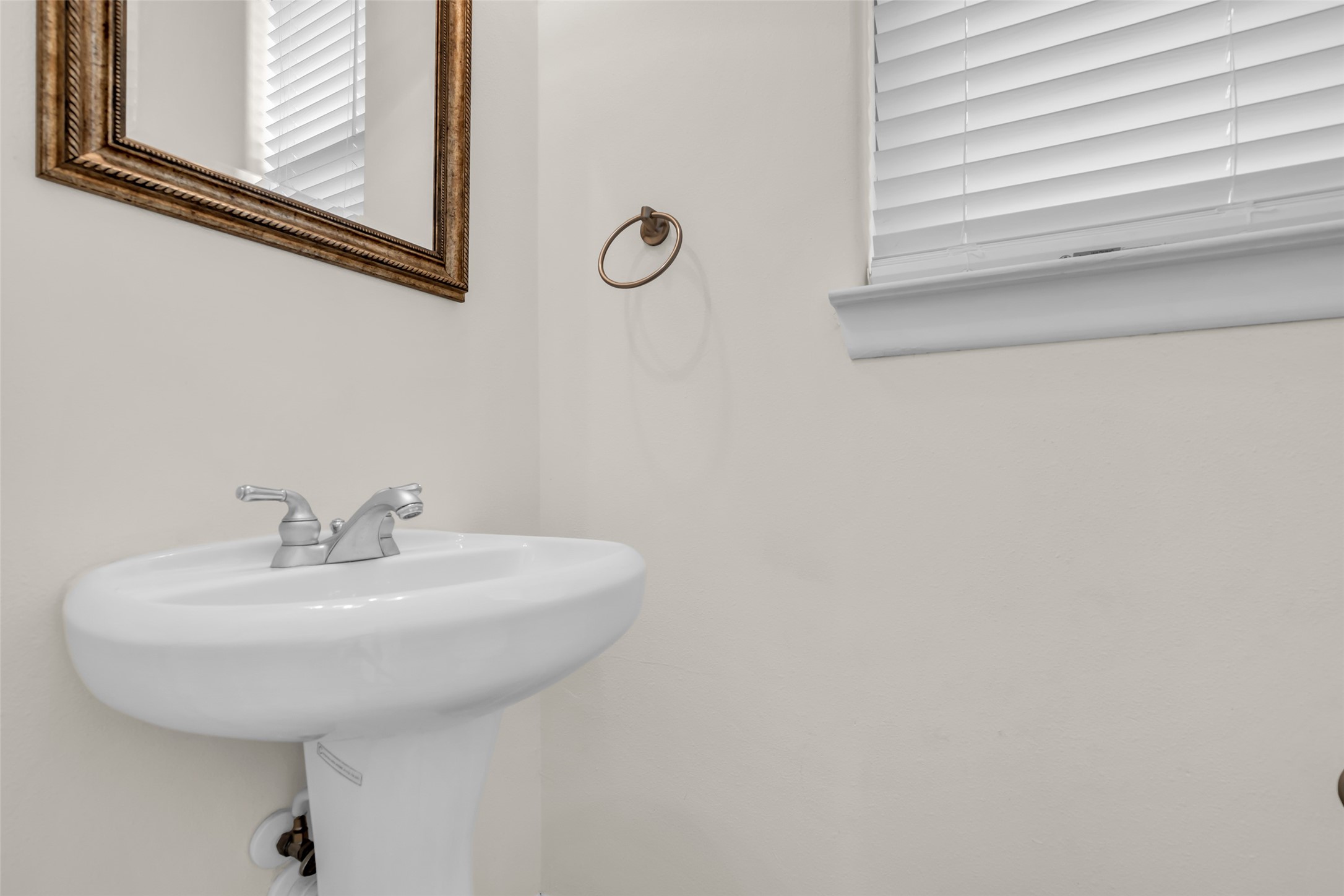 1803 Stacy Crest Houston, TX 77008 - Photo 16 of 28 The second-floor half bath features a simple, functional layout designed for convenience.