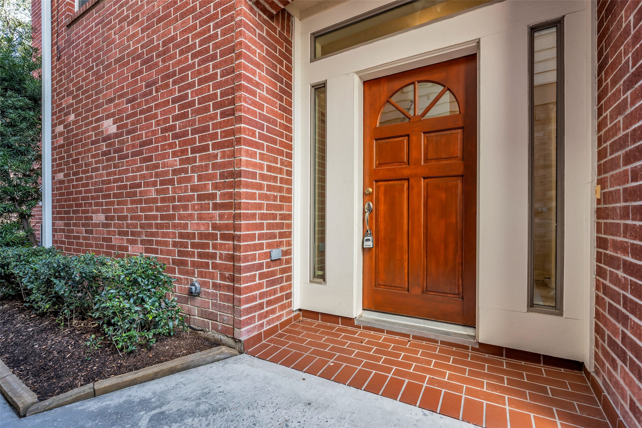 1803 Stacy Crest Houston, TX 77008 - Photo 2 of 28 The home features a classic brick exterior with a welcoming main entrance that creates a strong first impression.