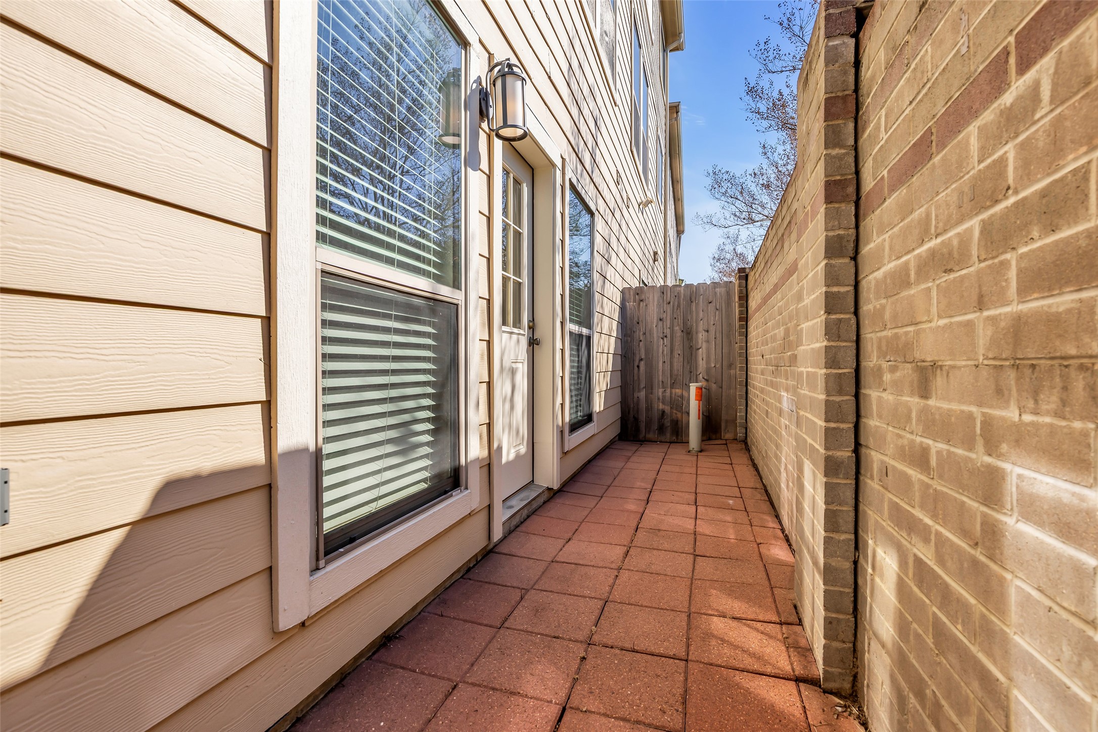 1803 Stacy Crest Houston, TX 77008 - Photo 24 of 28 The back patio provides additional space for outdoor activities and relaxation.