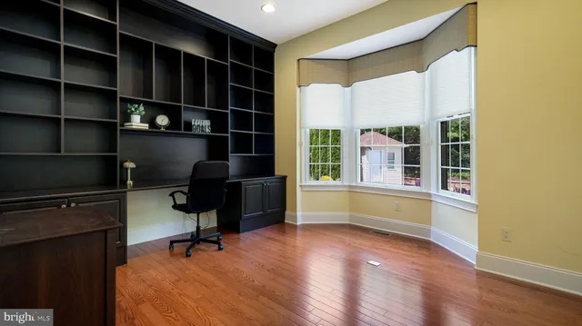 a bathroom with sink and mirror