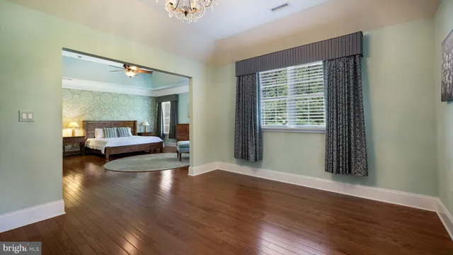 a bathroom with sinks granite counter tops and a sink