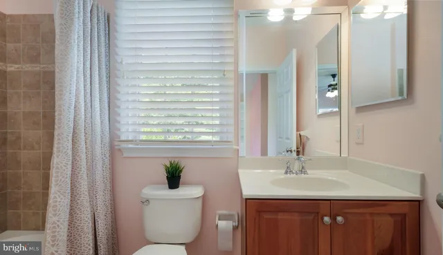 a view of a house with swimming pool and yard