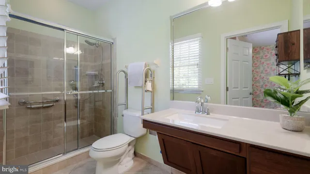 a view of a house with backyard sitting area and garden