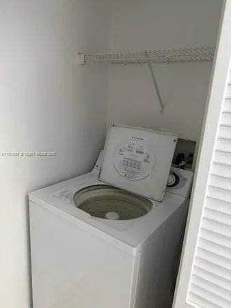 a stove top oven sitting inside of a kitchen