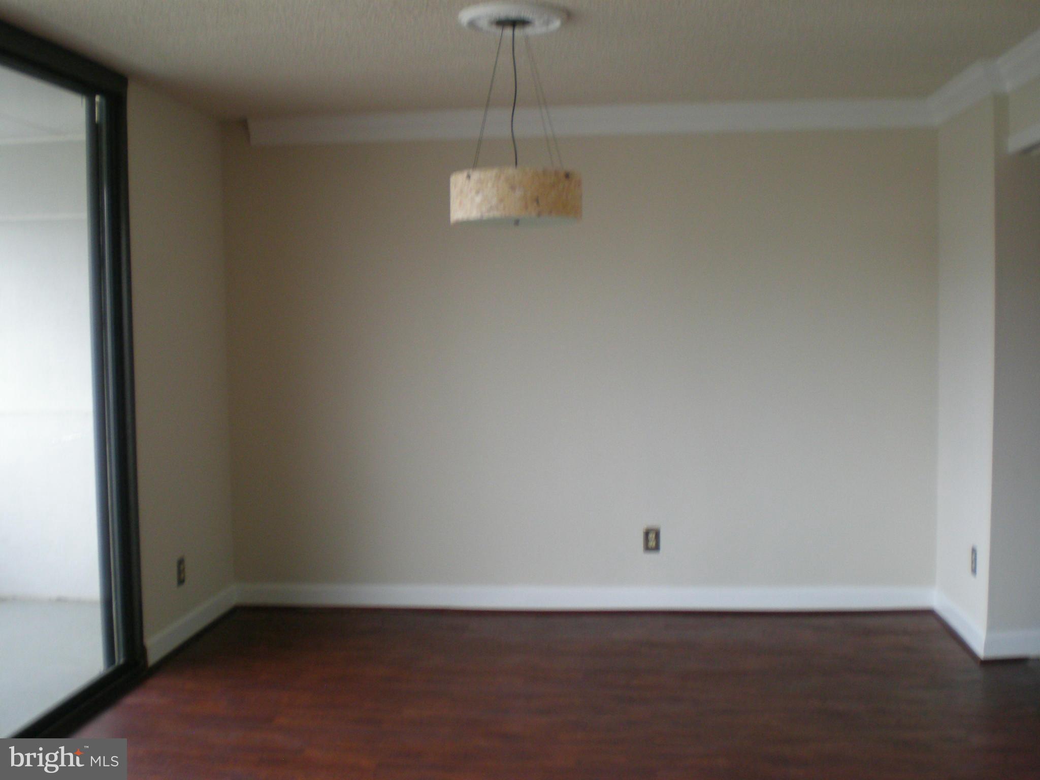 6101 Edsall Road, Unit 1412 Alexandria, VA 22304 - Photo 13 of 17 a view of a room with an empty room