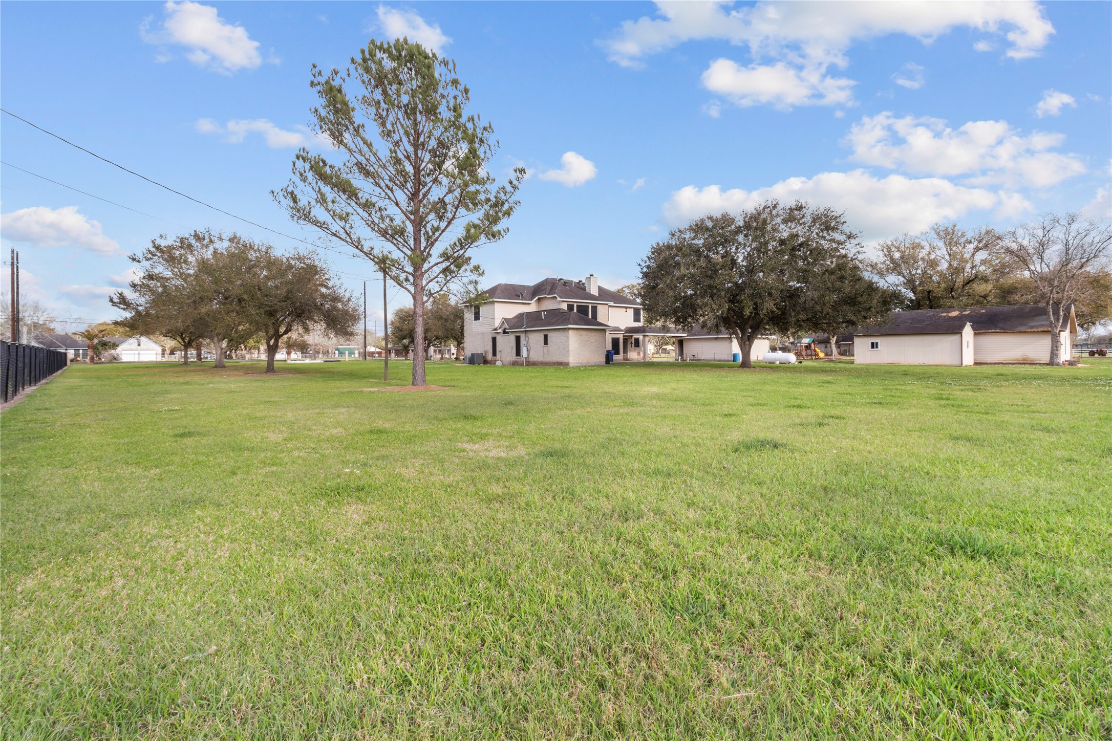 10302 Hanselman Road, Unit CR69 Manvel, TX 77578 - Photo 11 of 49 a view of a field with tree s