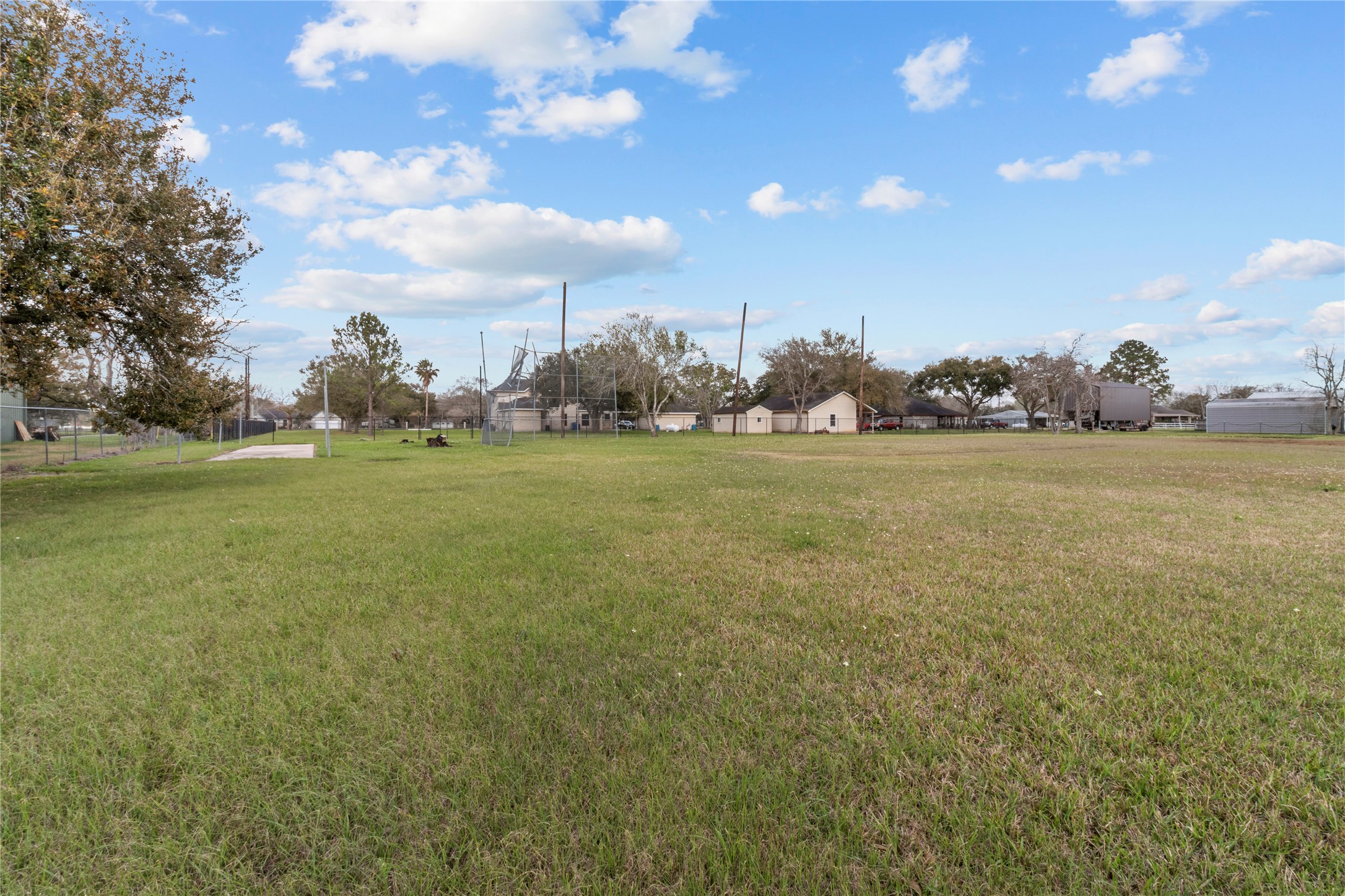 10302 Hanselman Road, Unit CR69 Manvel, TX 77578 - Photo 13 of 49 a view of a big yard with an outdoor space
