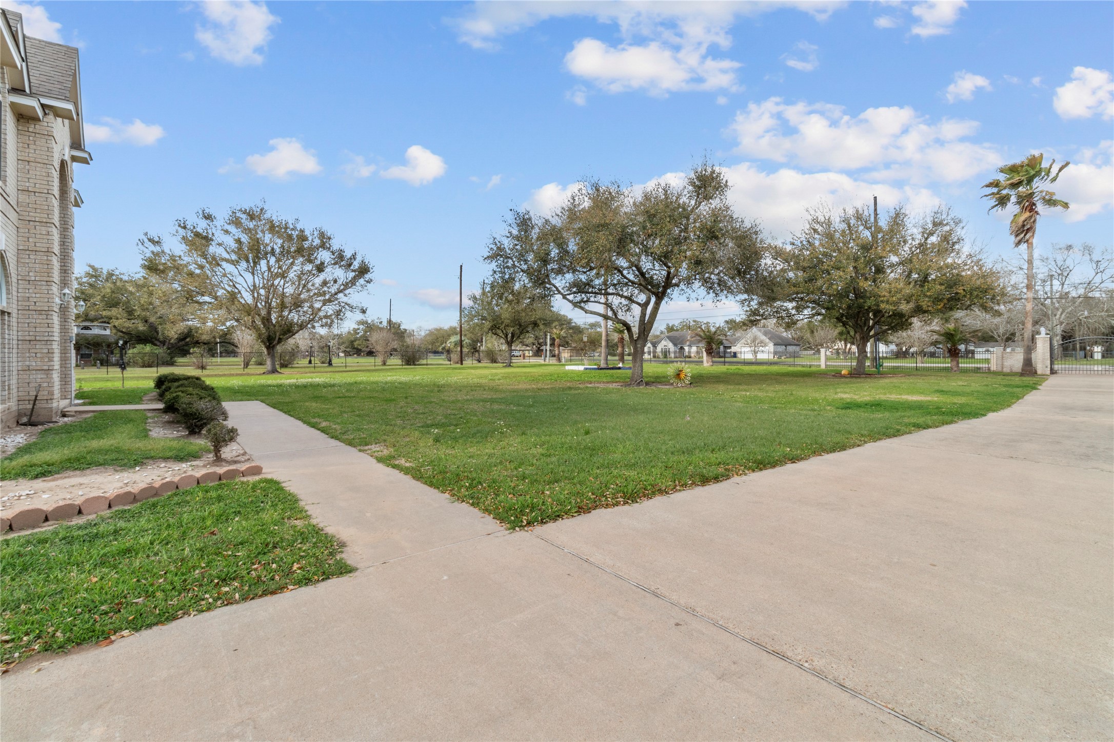 10302 Hanselman Road, Unit CR69 Manvel, TX 77578 - Photo 14 of 49 a view of a park with large trees