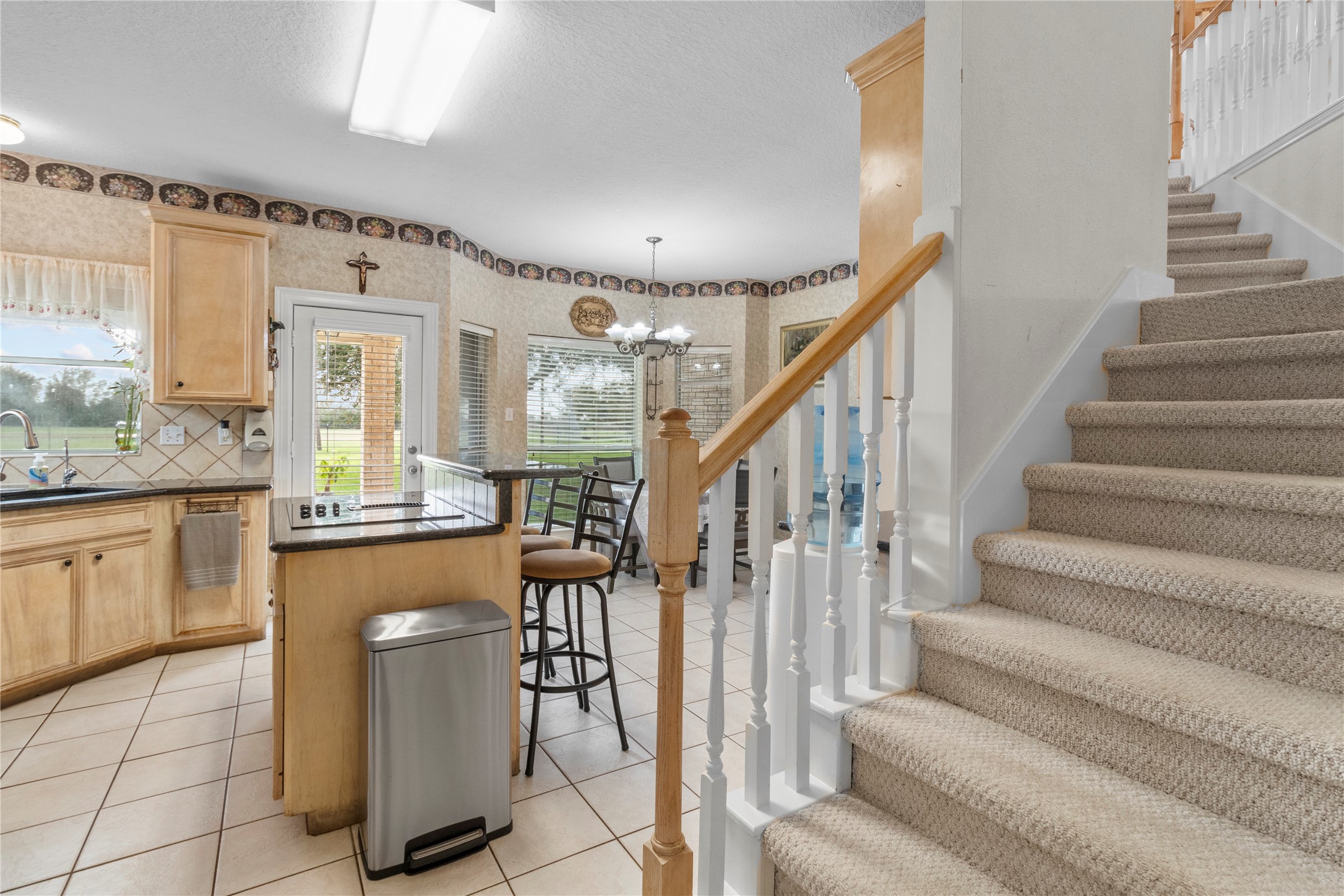 10302 Hanselman Road, Unit CR69 Manvel, TX 77578 - Photo 29 of 49 a kitchen with sink and cabinets