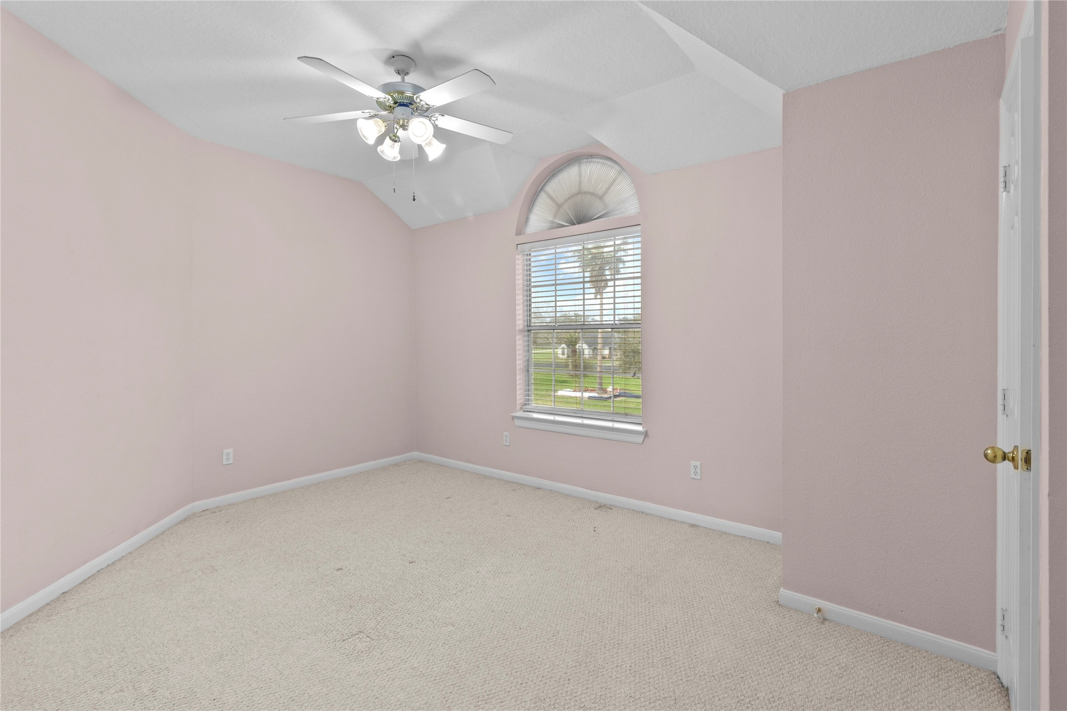 10302 Hanselman Road, Unit CR69 Manvel, TX 77578 - Photo 41 of 49 an empty room with windows and fan