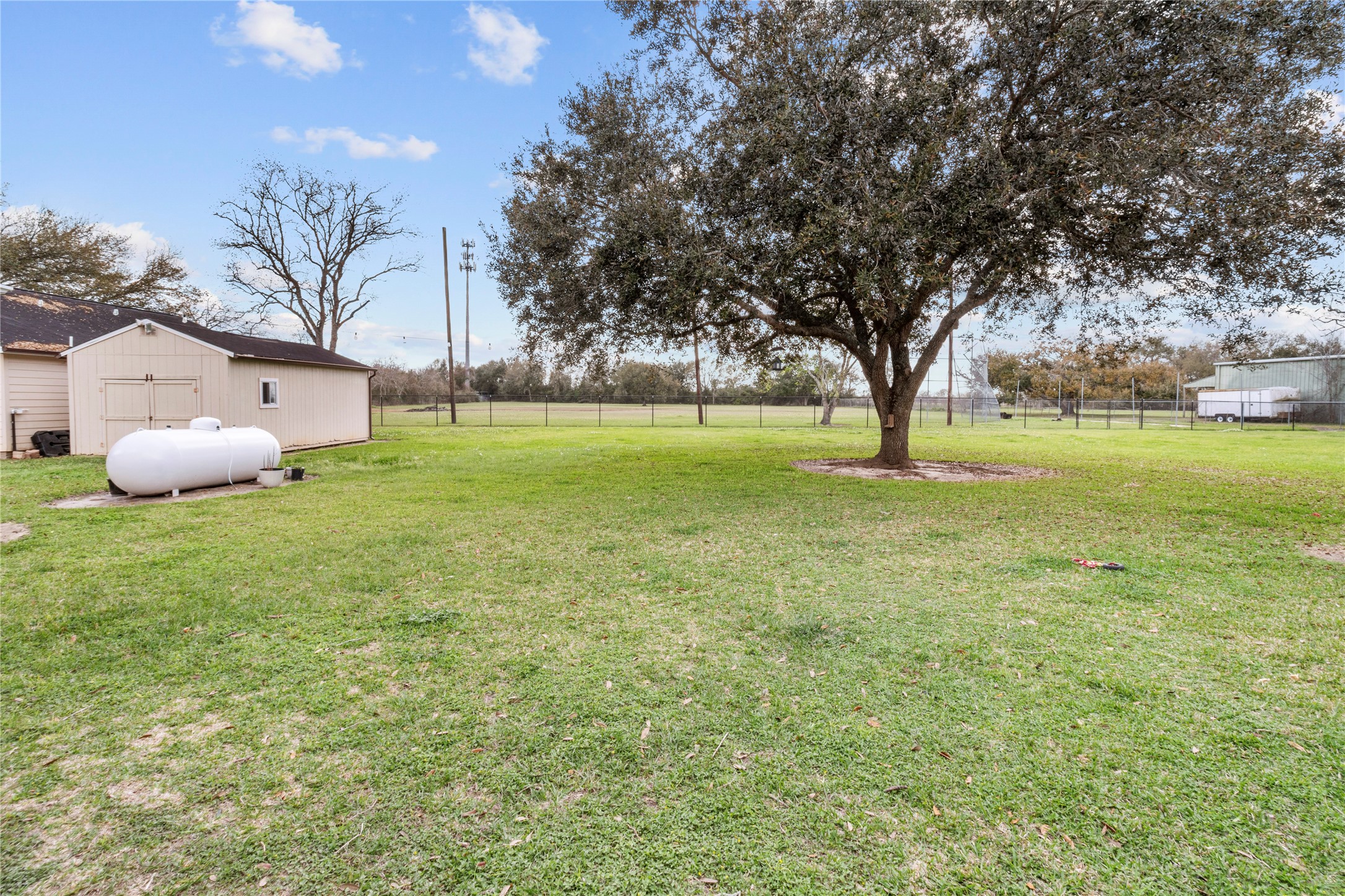 10302 Hanselman Road, Unit CR69 Manvel, TX 77578 - Photo 8 of 49 a backyard of a house with lots of green space
