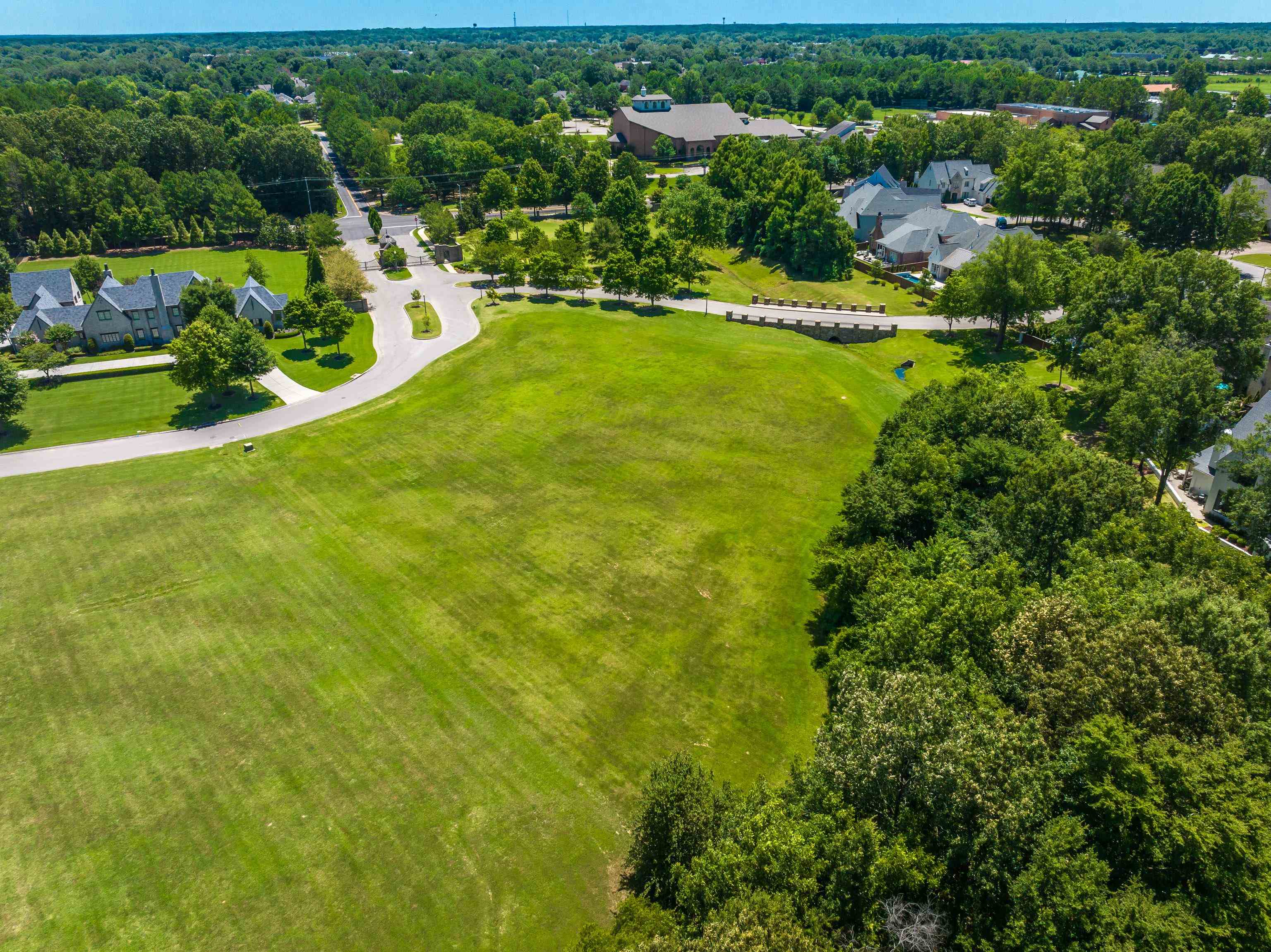 0 Dubray Manor Drive Collierville, TN 38017 - Photo 9 of 12 a view of a garden with a lake