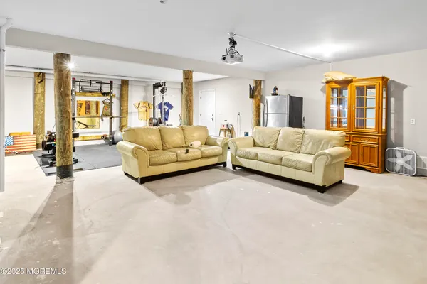 a bathroom with a toilet a sink and a mirror