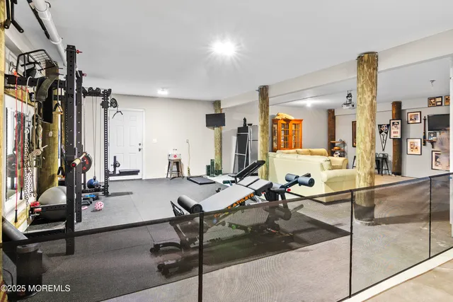 a view of room with gym equipment