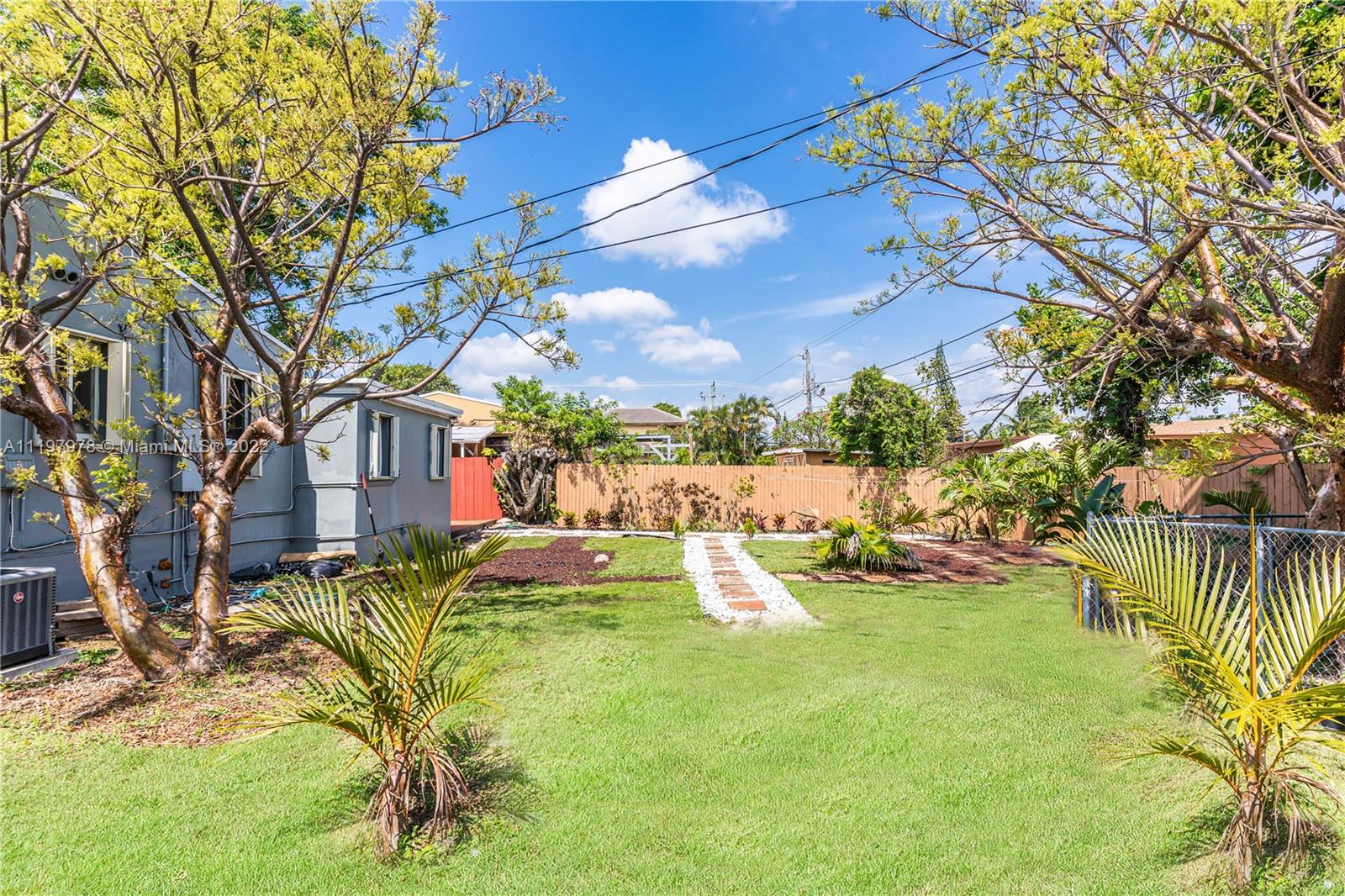 2123 Funston Street Hollywood, FL 33020 - Photo 20 of 30 a view of a house with a yard