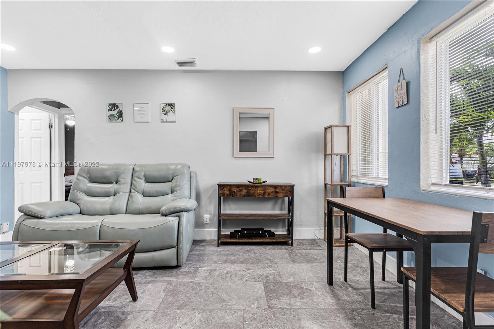 2123 Funston Street Hollywood, FL 33020 - Photo 3 of 30 a living room with furniture and a window