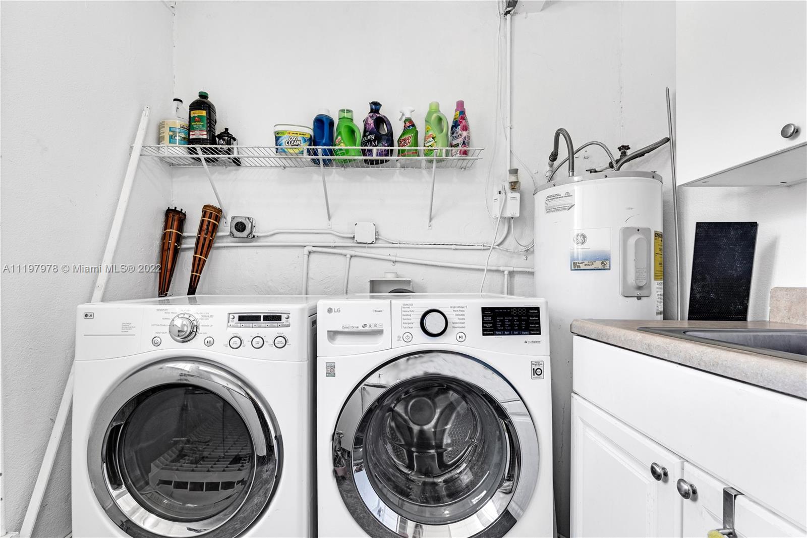 2123 Funston Street Hollywood, FL 33020 - Photo 7 of 30 a utility room with dryer and washer
