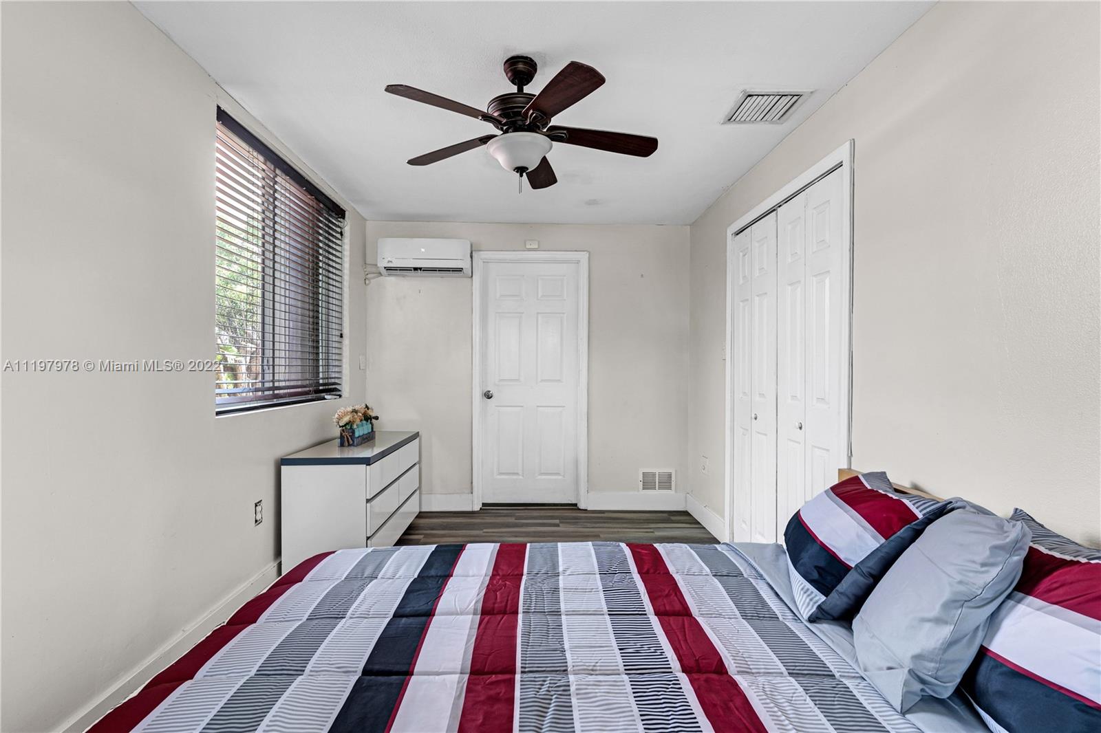 2123 Funston Street Hollywood, FL 33020 - Photo 10 of 30 a living room with a rug and a wooden floor