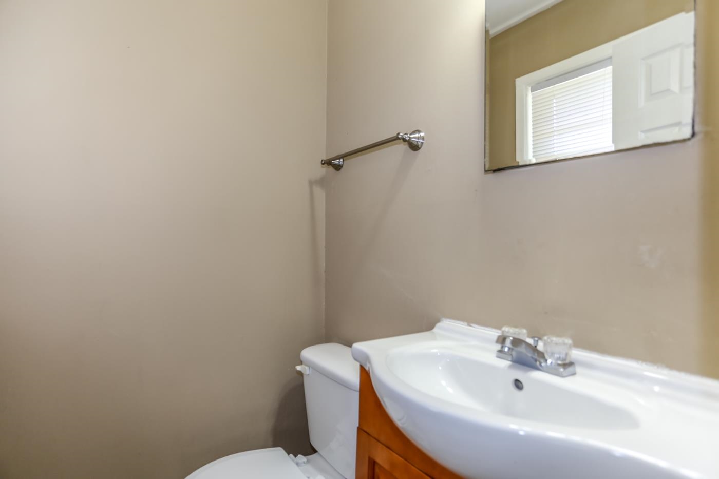 4705 Owen Road Memphis, TN 38122 - Photo 15 of 18 a bathroom with a sink mirror and toilet