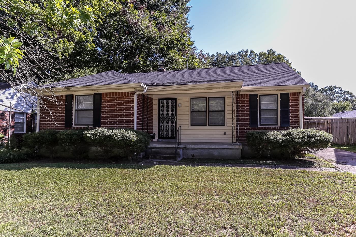 4705 Owen Road Memphis, TN 38122 - Photo 2 of 18 a view of a house with garden and yard