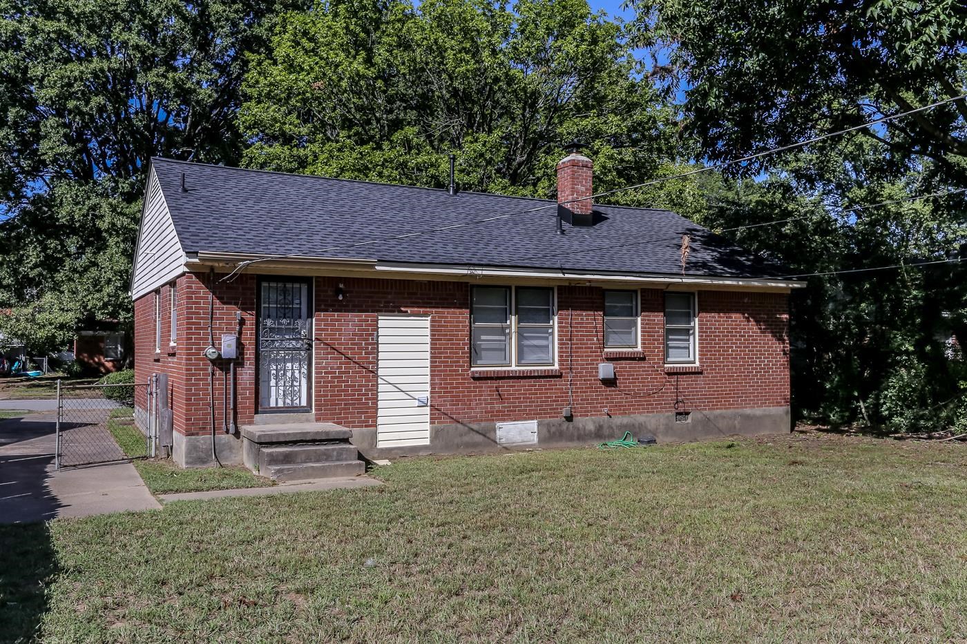 4705 Owen Road Memphis, TN 38122 - Photo 4 of 18 a front view of a house with a yard and garage