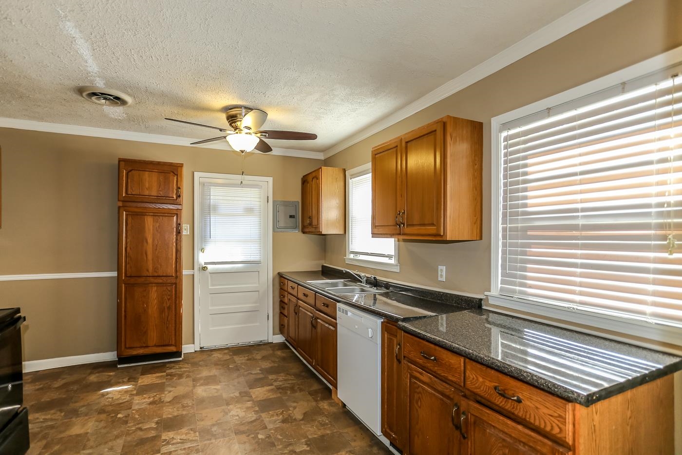 4705 Owen Road Memphis, TN 38122 - Photo 9 of 18 a kitchen with stainless steel appliances granite countertop a refrigerator a stove and a sink