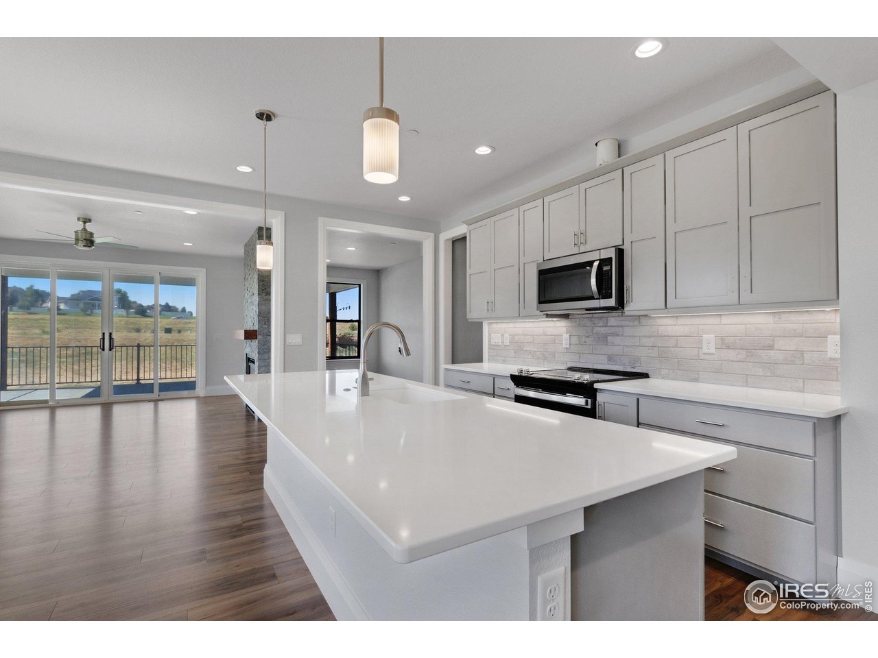 5700 2nd Road Greeley, CO 80634 - Photo 15 of 40 Quartz (granite is available) countertops in the kitchen and all baths