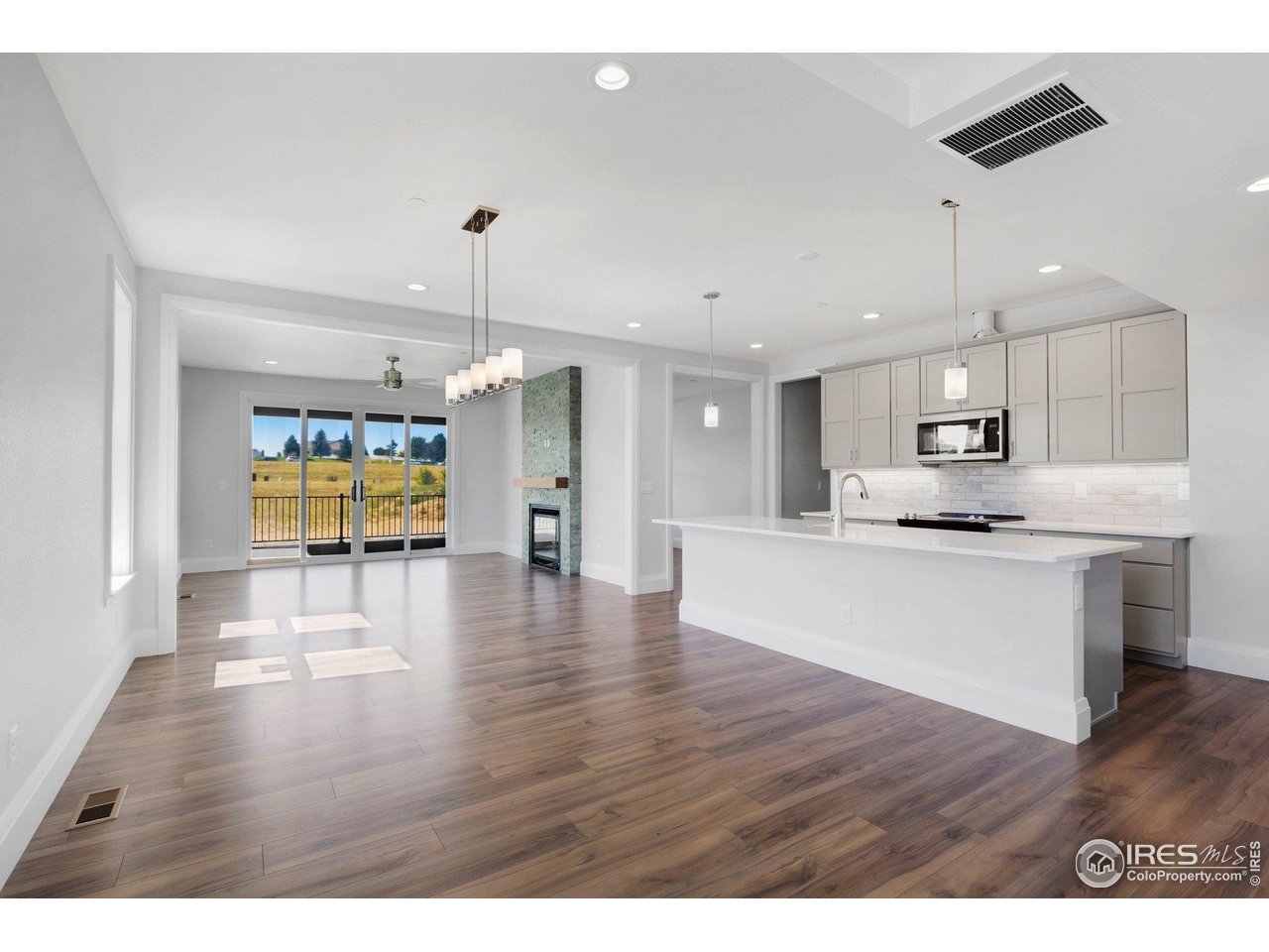 5700 2nd Road Greeley, CO 80634 - Photo 9 of 40 Enjoy the grandness brought by the double patio doors