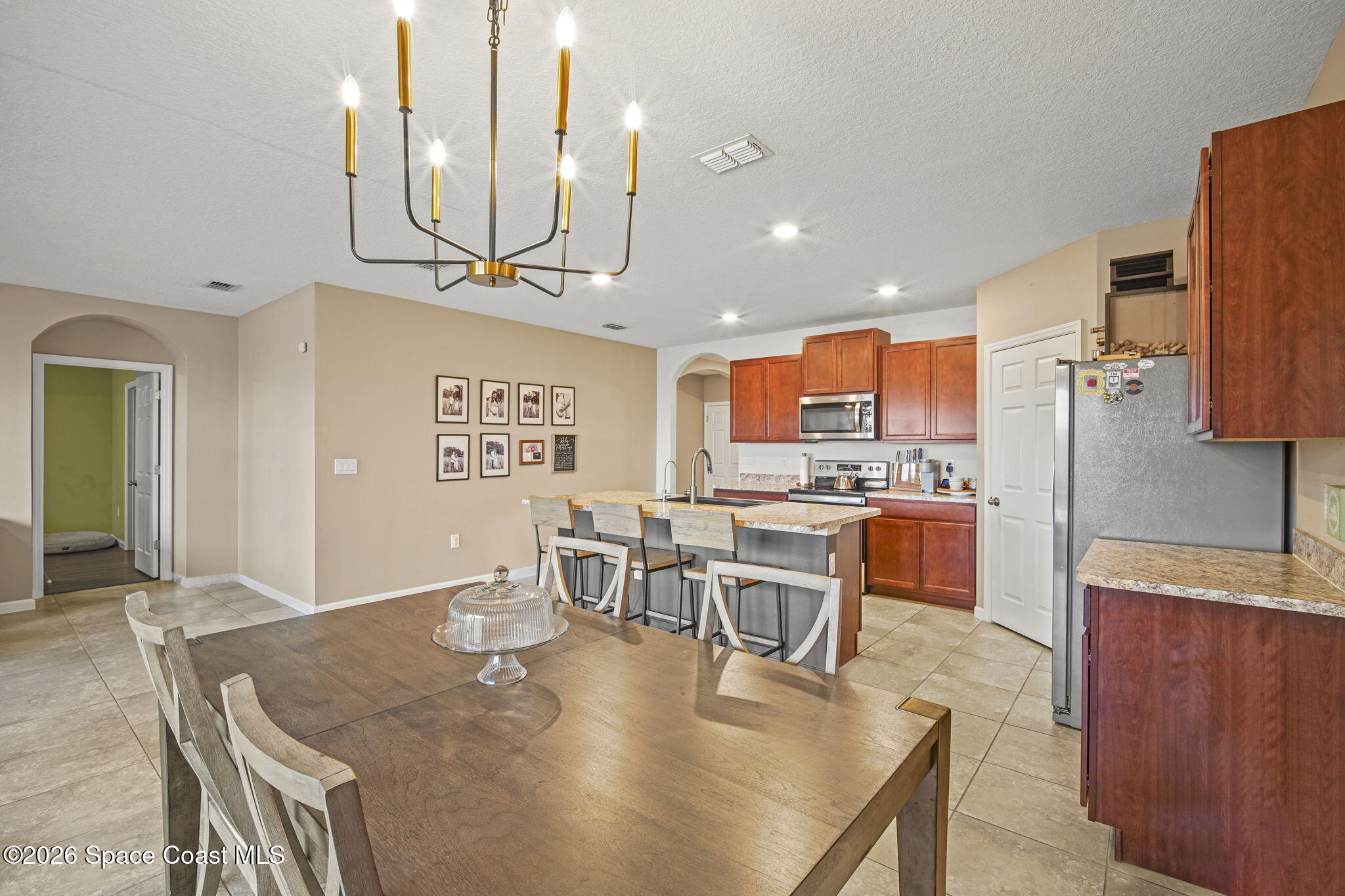 3818 Loggerhead Lane Mims, FL 32754 - Photo 11 of 30 11-web-or-mls-LOGGERHEAD_DINING6 (2)