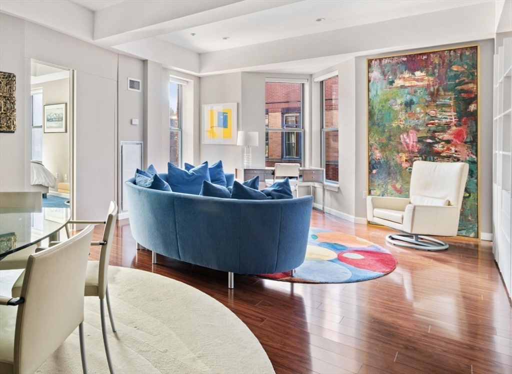 35 Fay Street, Unit 215 Boston, MA 02118 - Photo 1 of 14 a living room with furniture and wooden floor