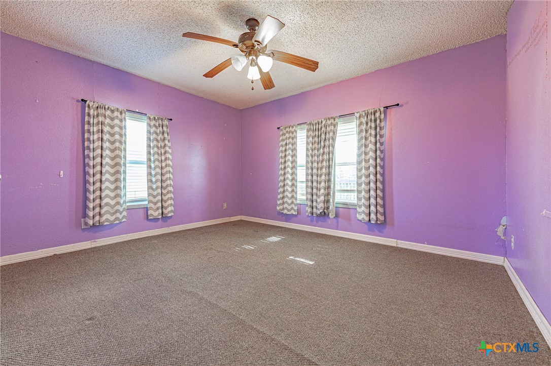 3300 State Highway 95 Shiner, TX 77984 - Photo 14 of 26 a view of empty room with window