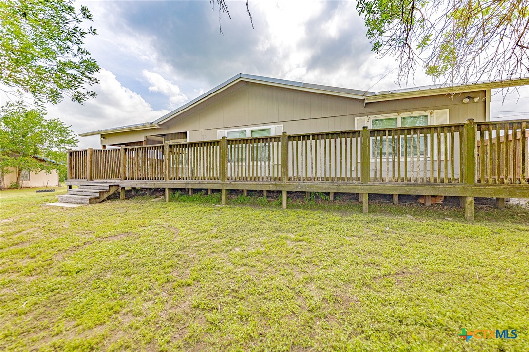 3300 State Highway 95 Shiner, TX 77984 - Photo 2 of 26 a view of a house with a yard balcony