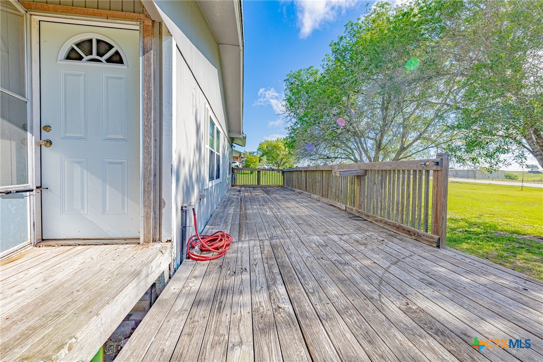 3300 State Highway 95 Shiner, TX 77984 - Photo 7 of 26 a view of outdoor space with deck and backyard