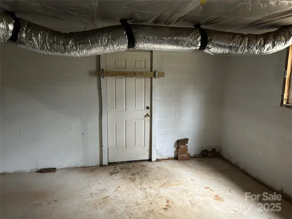 a view of storage and utility room