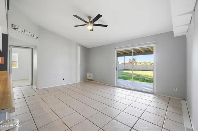 a view of an empty room and window