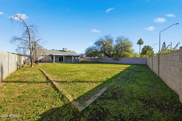 a view of a swimming pool with an outdoor space