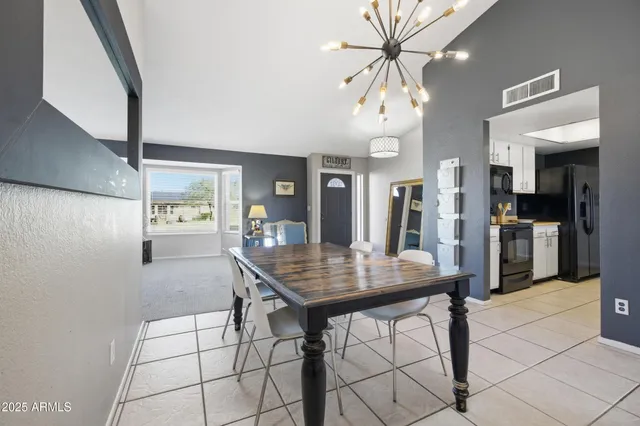 a view of a dining room with furniture