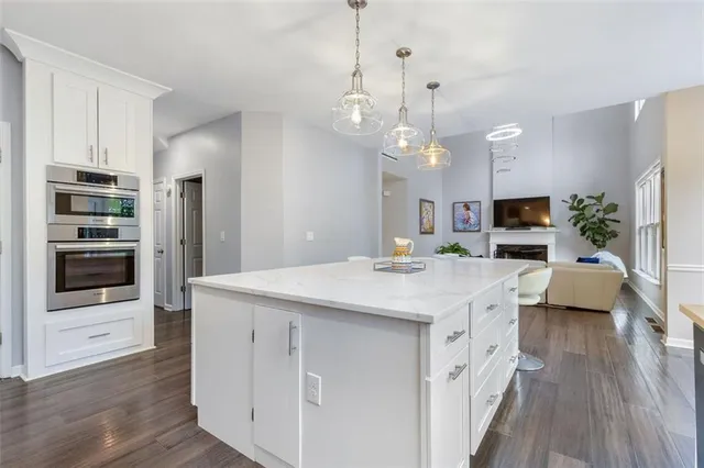 a view of a deck with wooden floor and seating space