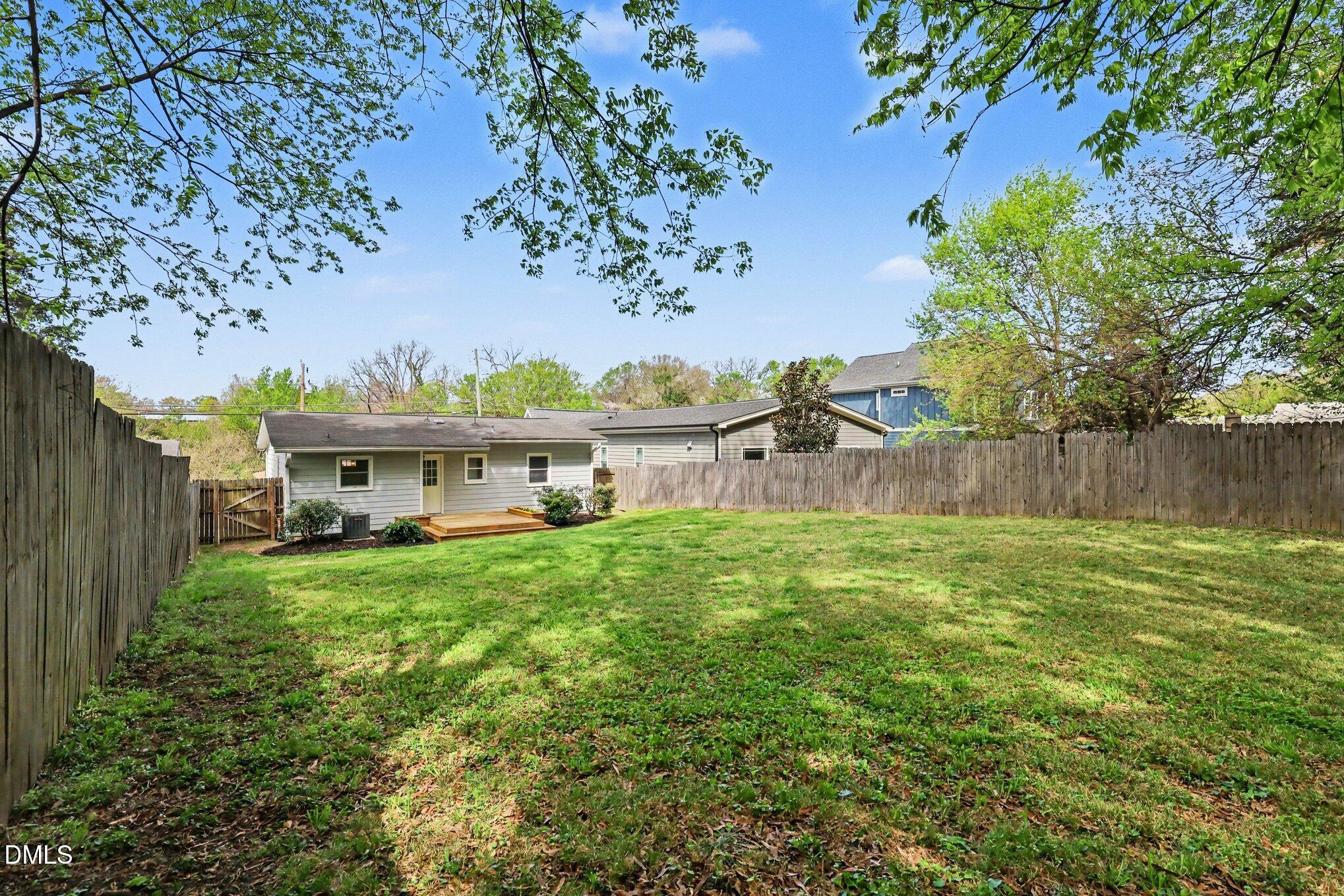 727 South State Street Raleigh, NC 27601 - Photo 25 of 30 a view of a house with a garden