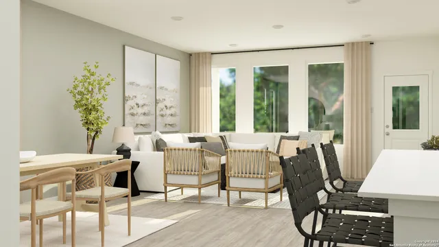 a view of a dining room with furniture window and outside view