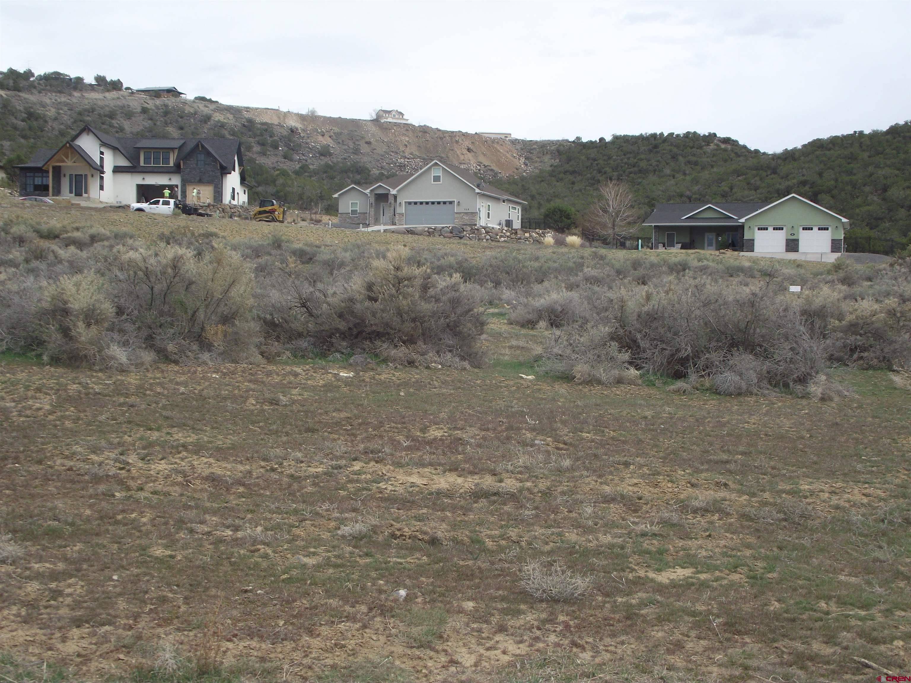 735 Southeast Pinyon Street Cedaredge, CO 81413 - Photo 12 of 12 a view of a dry grass field