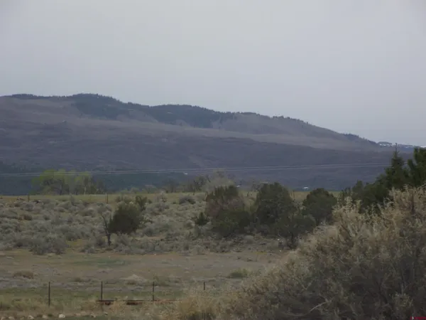 a view of an outdoor space with mountain view