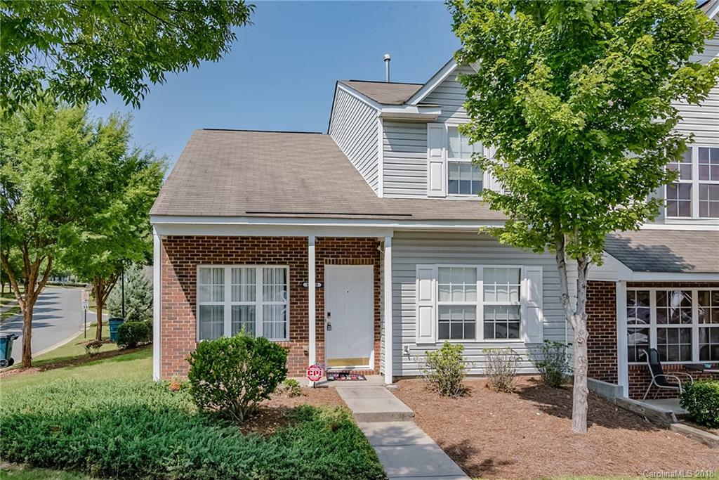 11228 Grass Field Road Charlotte, NC 28213 - Photo 2 of 26 a front view of a house with garden