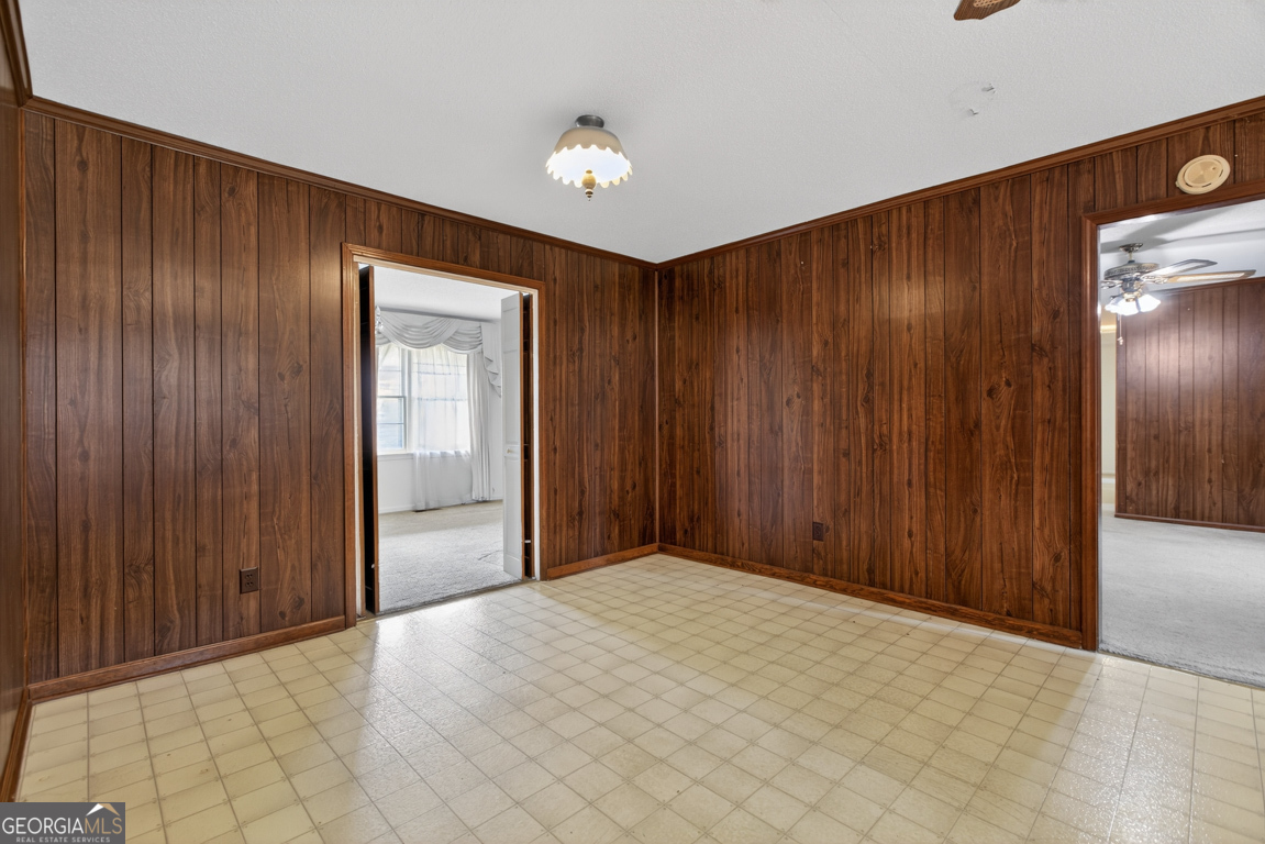 3369 Sandy Circle Macon, GA 31216 - Photo 16 of 65 a view of an empty room with wooden floor