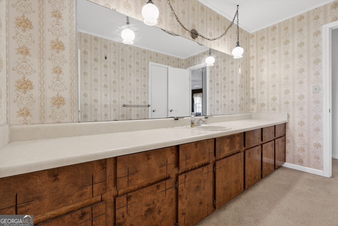 3369 Sandy Circle Macon, GA 31216 - Photo 24 of 65 a bathroom with a double vanity sink and a mirror