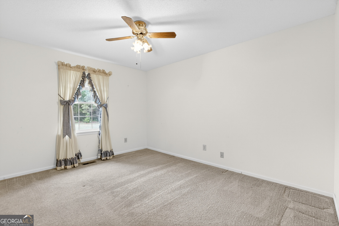 3369 Sandy Circle Macon, GA 31216 - Photo 27 of 65 an empty room with a window